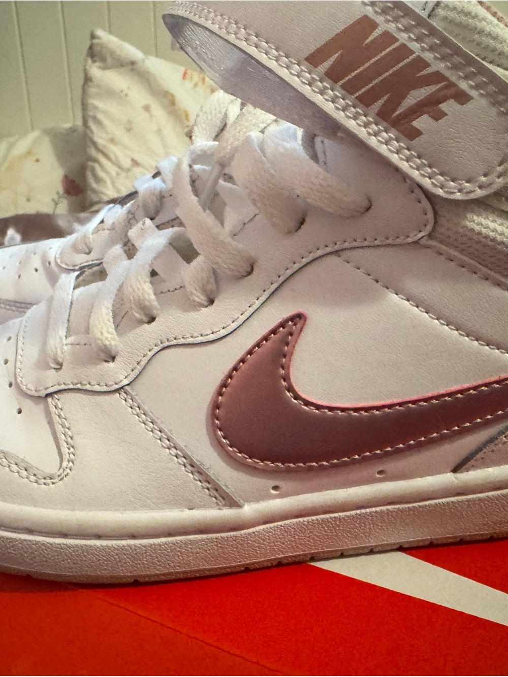Nike Kids White High-Top Sneakers with Metallic Pink Swoosh